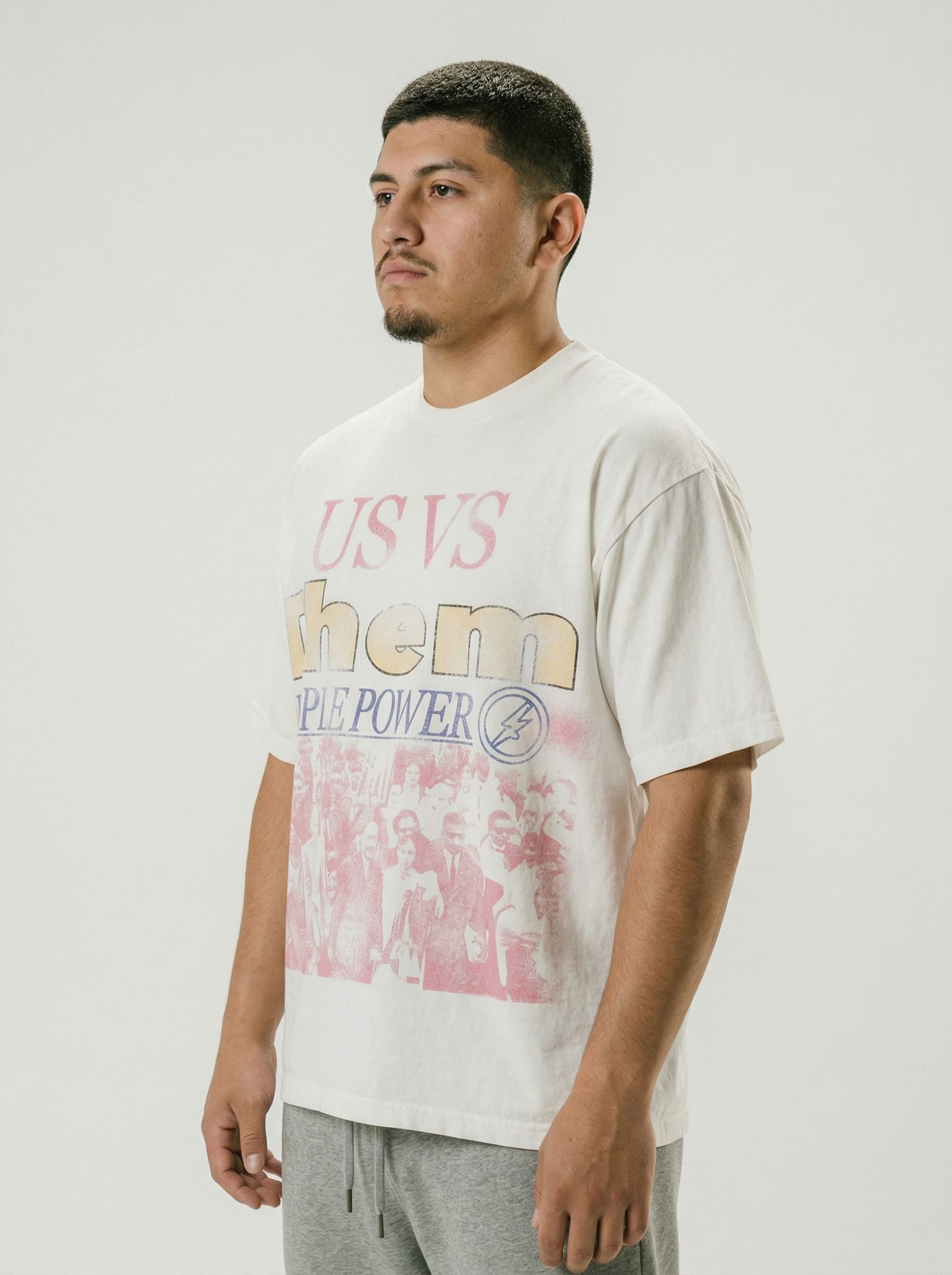 People Power tee alternate angle - three quarter view of model